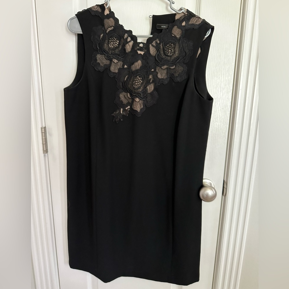 BCBG black dress with lace detail on chest and over shoulders. Size medium. - Picture 1 of 4